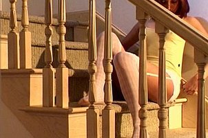 Slut in stockings wanks with slim dildo.