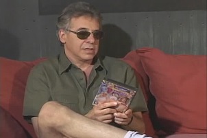 Brian and jodie having fun on the red sofa.